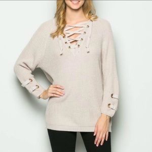 Miracle cream sweater with lace up detail